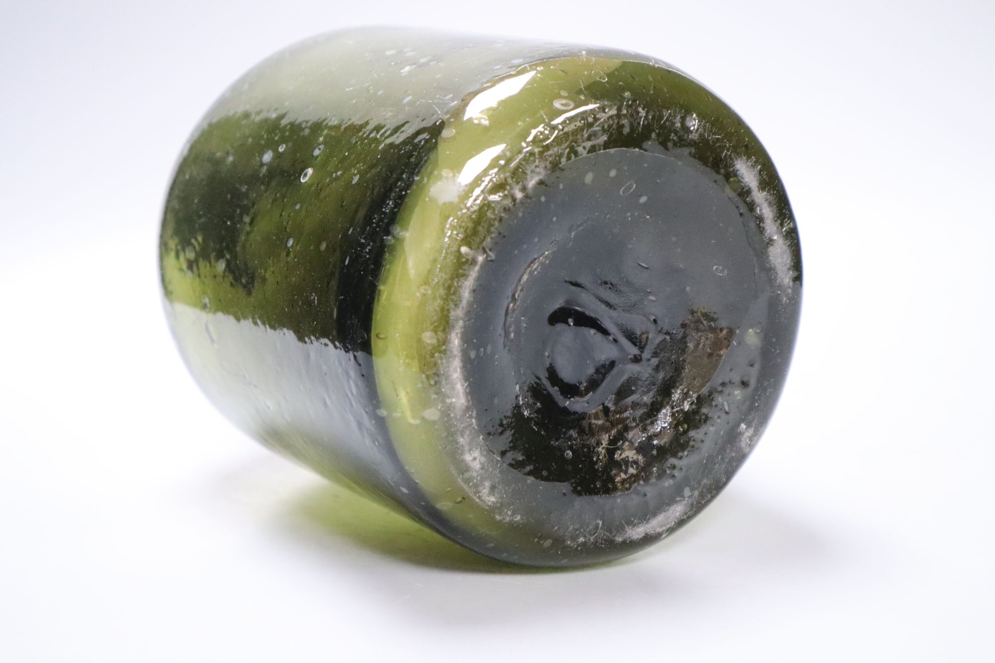 A 19th century green glass demijohn bottle, 34cm